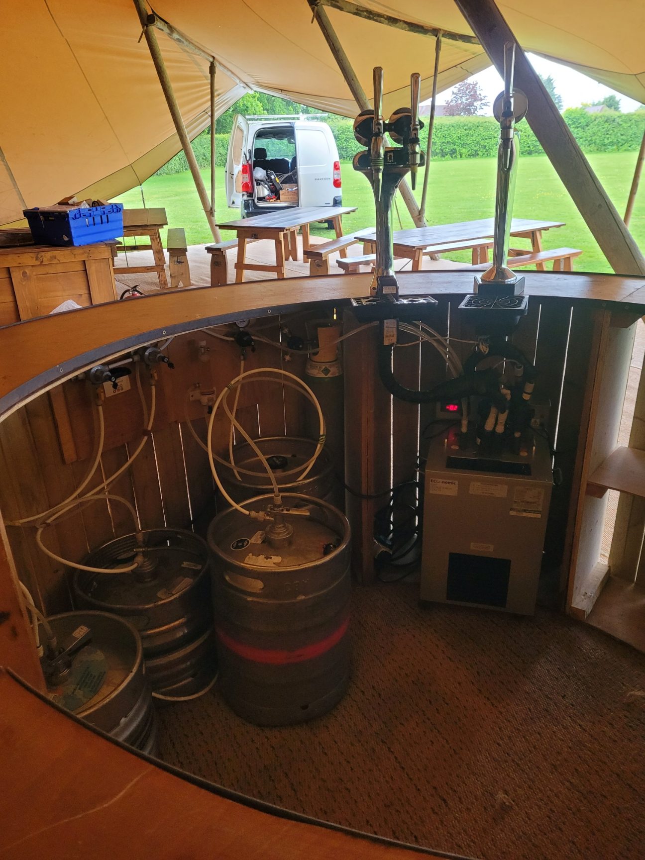 Circular mobile bar with draught beer setup for wedding in Kent